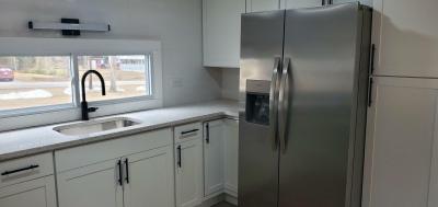 Photo 5 of 11 of home located at 15 Hemlock Road Tilton, NH 03276