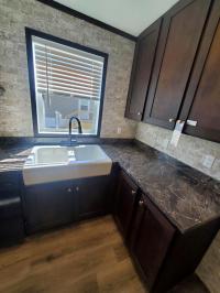 2022 Clayton Wakarusa 96AMF16763BH22   (Model Series- American Made)  Model Name - 7616-510 Farmstead  Home