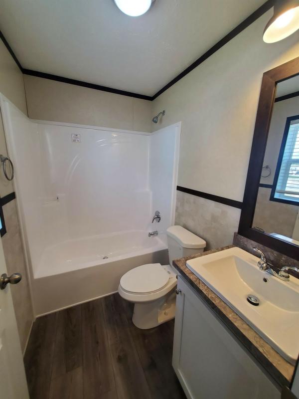 2022 Clayton Wakarusa 96AMF16763BH22   (Model Series- American Made)  Model Name - 7616-510 Farmstead  Home