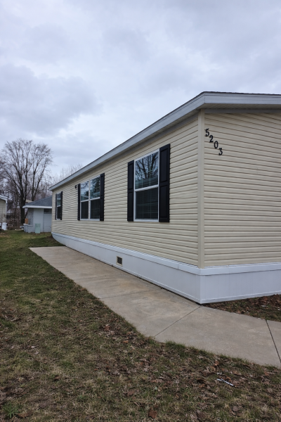 Photo 2 of 19 of home located at 5203 Village Dr. #123 Wyoming, MI 49509