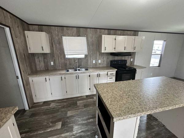 2018 Champion 12-10G-RM2852A Mobile Home