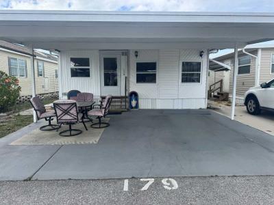 Photo 2 of 32 of home located at 6735 Hammock Rd Lot 179 Port Richey Adult Community, FL 34688