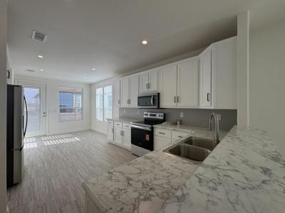 Photo 2 of 20 of home located at 3301 S Goldfield Road Lot 5114 Apache Junction, AZ 85119