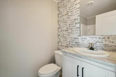 Photo 4 of 6 of home located at 2240 Douglas Dr Highland, MI 48357