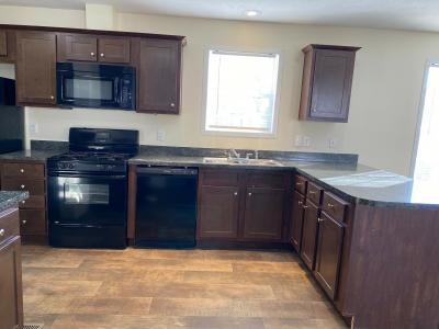 Photo 2 of 7 of home located at 3347 Creekside Blvd Burton, MI 48519