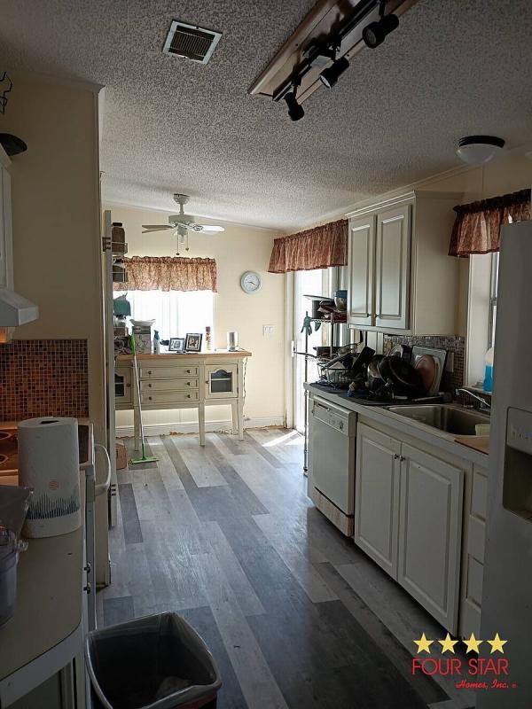 2001 JACOBSEN  Home
