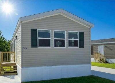 Photo 1 of 8 of home located at 2668 Pear Street, Lot 154 Alanson, MI 49706