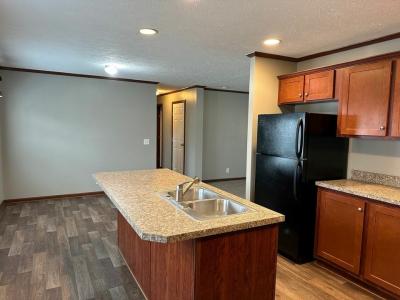 Photo 4 of 11 of home located at 9775 Russell St Northville, MI 48167