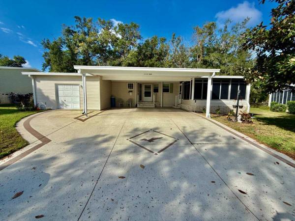 Photo 1 of 2 of home located at 935 W Norman St, #2642 Lady Lake, FL 32159