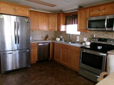 Photo 5 of 14 of home located at 7100 Ulmerton Rd Lot 1213 Largo, FL 33771