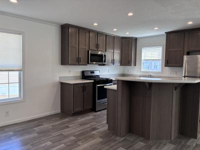 Photo 3 of 9 of home located at 2656 E Tartan Ct Highland, MI 48357