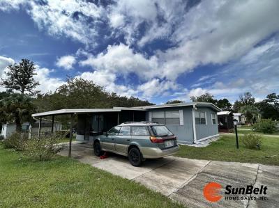 Photo 2 of 46 of home located at 2828 NE 49th Avenue Lot 99 Ocala, FL 34470