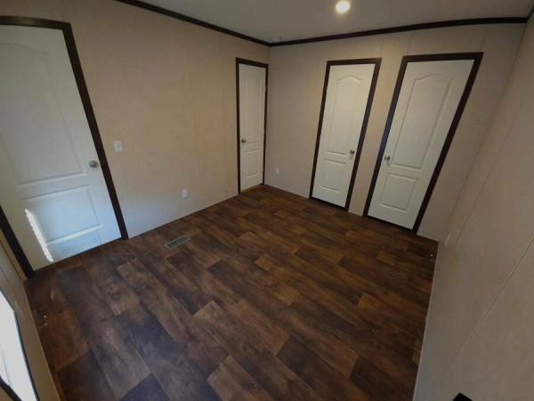 2023 166032A  Home