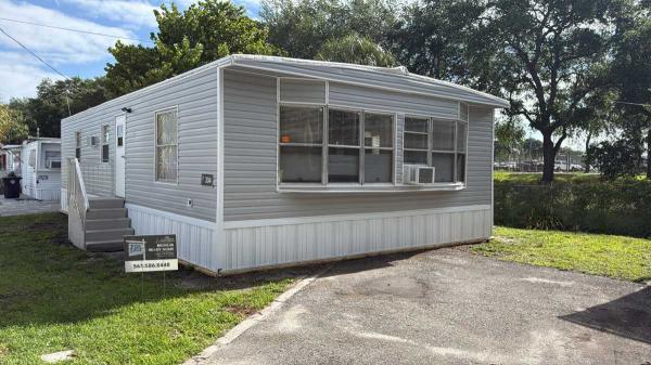 Photo 1 of 2 of home located at 304 Evergreen Dr Lake Worth, FL 33461