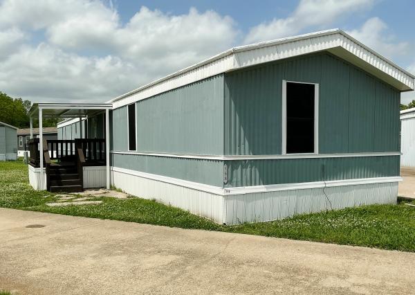 Photo 1 of 2 of home located at 1077 Oxford Court Lot #158 Greenville, TX 75401