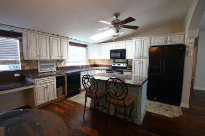 Photo 3 of 10 of home located at 1607 NW 24th St. Lot 696 Boynton Beach, FL 33436