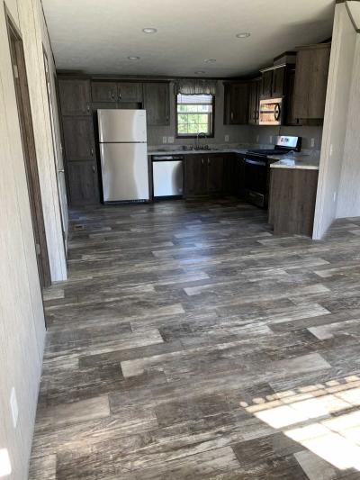 Photo 4 of 13 of home located at 10601 Hulser Rd, Lot 127 Utica, NY 13502