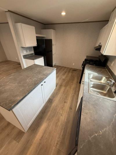 Photo 5 of 7 of home located at 855 1st St., Normal, IL 61761