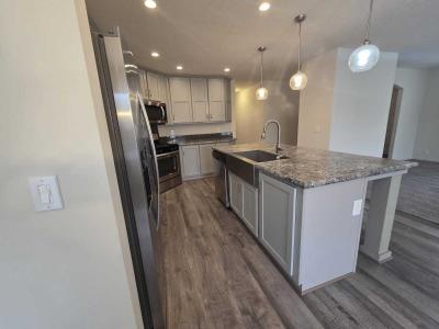 Photo 3 of 19 of home located at 3875 Emerald Park Rd. Milford, MI 48380