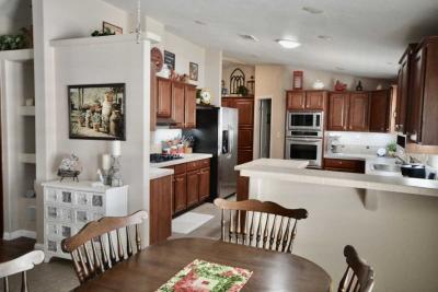Photo 5 of 30 of home located at 8840 East Sunland Ave. Lot 148 Mesa, AZ 85208