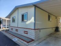 1998 Champion Home Builders Americana LTD  Manufactured Home