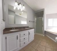 1998 Champion Home Builders Americana LTD  Manufactured Home