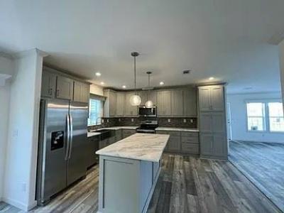 Photo 4 of 21 of home located at 34873 Robins Song Road Zephyrhills, FL 33541