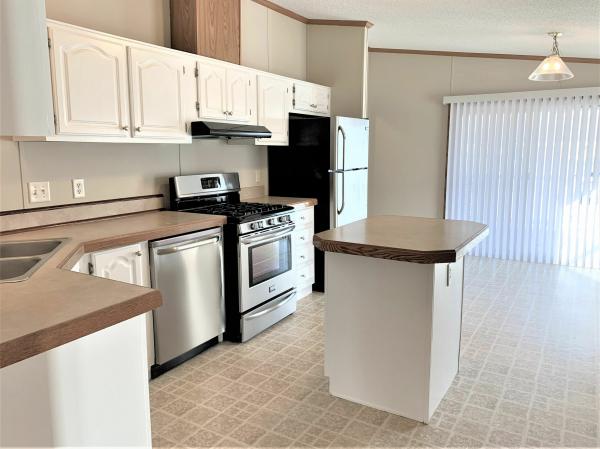 Photo 1 of 2 of home located at 45567 Nichole Dr., Site #121 Macomb, MI 48044