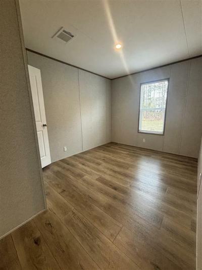 Photo 5 of 11 of home located at 10026 S Xavier St Conroe, TX 77303