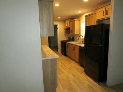 Photo 4 of 11 of home located at 17381 Oak Grove Brownstown, MI 48174