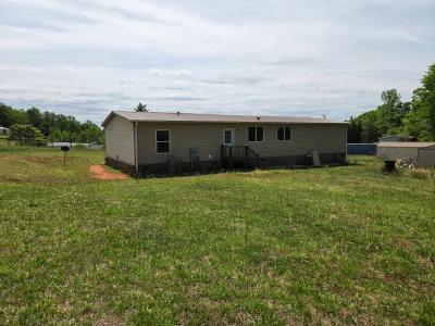 Photo 3 of 21 of home located at 78 Buck Branch Rd Mill Spring, NC 28756