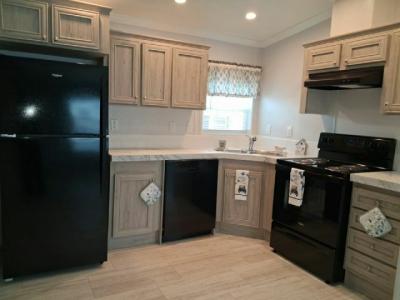 Photo 2 of 5 of home located at 6372 126th Ave. Lot #62 Largo, FL 33773