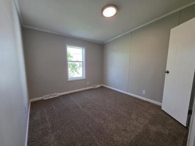 Photo 4 of 14 of home located at 718 Theresa Drive Flint, MI 48506