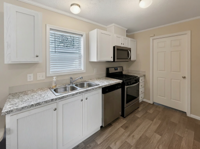 Photo 5 of 16 of home located at 15995 Villaire Ave Clinton Township, MI 48038