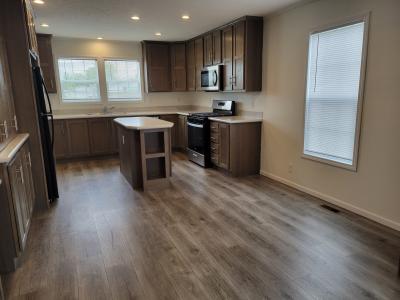 Photo 4 of 11 of home located at 216 E Ross Ct Highland, MI 48357