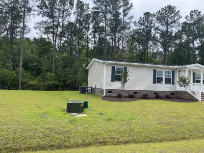 Photo 2 of 9 of home located at 66 Hampstead, NC 28443