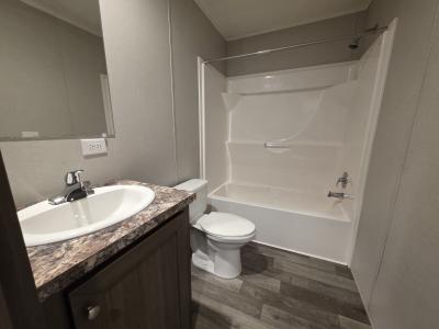 Photo 2 of 10 of home located at 703 Thomas J Drive Flint, MI 48506