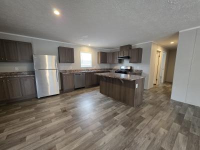 Photo 4 of 10 of home located at 703 Thomas J Drive Flint, MI 48506