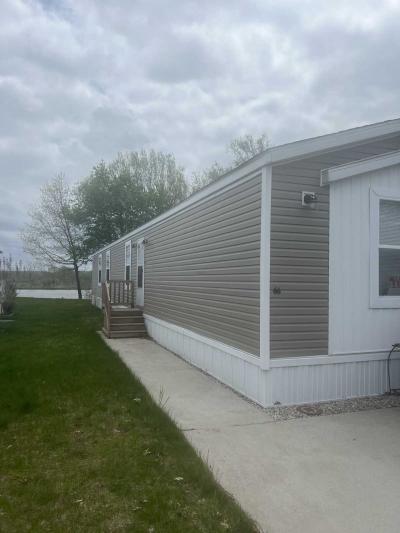 Mobile Home at 24 Caberfae Hwy, Lot 66 Manistee, MI 49660