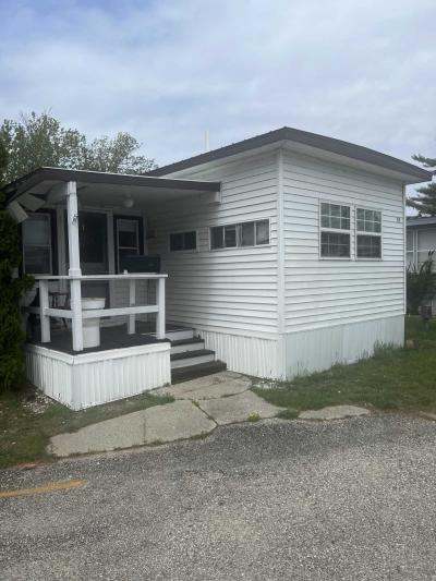 Mobile Home at 24 Caberfae Hwy, Lot 57 Manistee, MI 49660