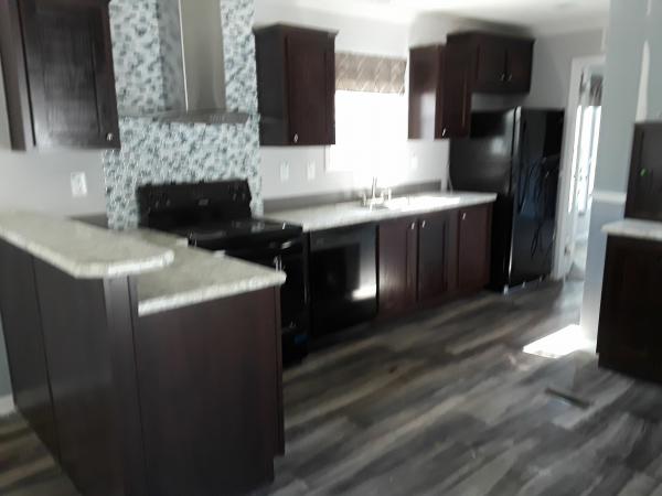 Photo 1 of 2 of home located at 7117 SW Archer Rd Lot #2327 Gainesville, FL 32608