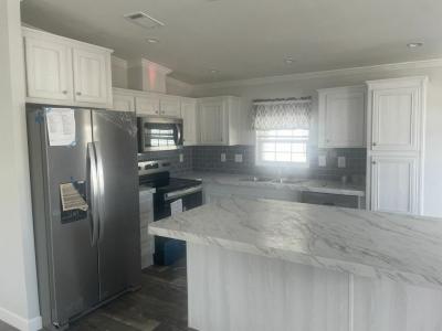 Photo 4 of 19 of home located at 13048 Orange Avenue Grand Island, FL 32735