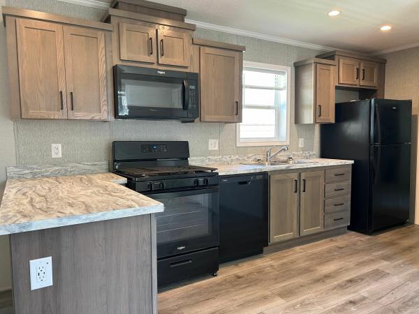 Photo 1 of 2 of home located at 1908 E 19th St. Lot W-80 Lot W080 Lawrence, KS 66046