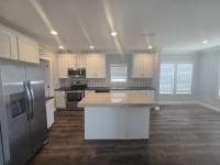 2023 Clayton 32DEV28443C Porch Mobile Home