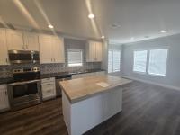 2023 Clayton 32DEV28443C Porch Mobile Home