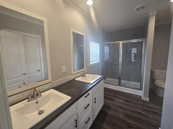 2023 Clayton 32DEV28443C Porch Mobile Home