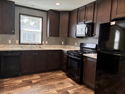 Photo 5 of 11 of home located at 2327 S Dundee Ct Highland, MI 48357