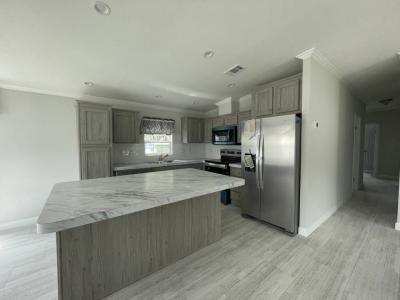 Photo 4 of 20 of home located at 13048 Orange Avenue Grand Island, FL 32735