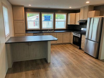 Photo 2 of 11 of home located at 1088 South Park Drive Brookfield, OH 44403