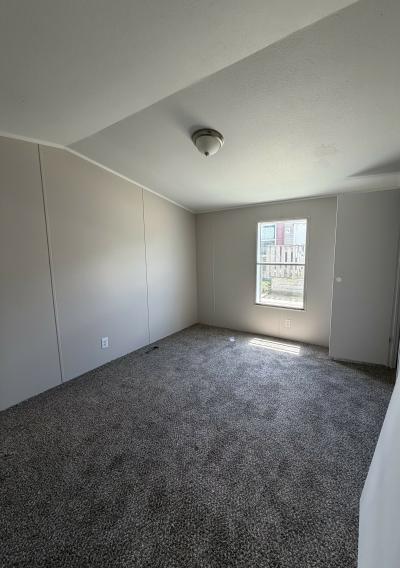Photo 2 of 4 of home located at 869 Pinecreek Dr Site 153 Middleville, MI 49333